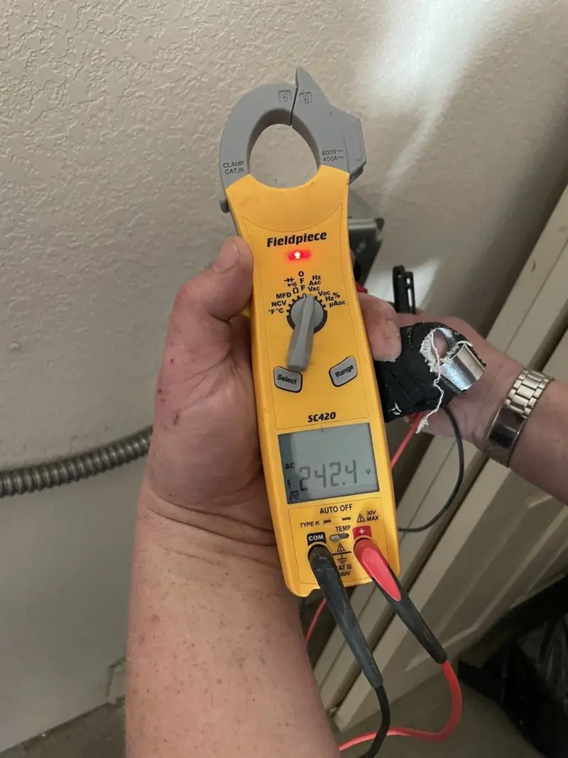 Voltage testing with clamp meter during Generator Installation in Blendon